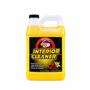 A 1 gallon jug of Rebels of Shine Interior Cleaner, featuring a black trigger sprayer and a black label with a yellow liquid inside, set against a plain white background.