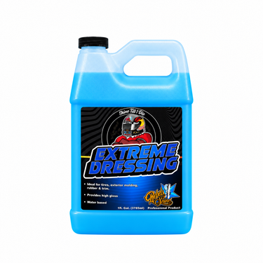 A 1-gallon plastic jug of Rebels of Shine Extreme Dressing, featuring a bright blue liquid, a black cap, and a black label with a red, white, and blue graphic.