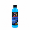 A 16oz bottle of Rebels of Shine Extreme Dressing, featuring a bright blue liquid, a black cap, and a black label with a red, white, and blue graphic.