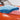 a Blue and a pink microfiber towel on a car hood