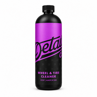 Bottle photo with a white background and vibrant purple label