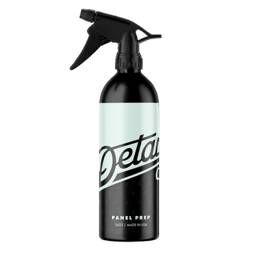 A black plastic 32 oz spray bottle of Detail Co. Panel Prep 80% Isopropyl Alcohol on a clean white background.